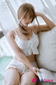 Jenny.O sexdoll SEdoll 163 cm silicone douce yeux fermés cheveux blonds pose détendue